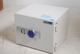 A contemporary floor safe by Omega with touch button  control ( with keypad number ) in working