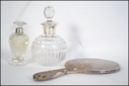 Two cut glass silver hallmarked collared perfume b