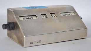 A silver hallmarked engine turned perpetual desk c