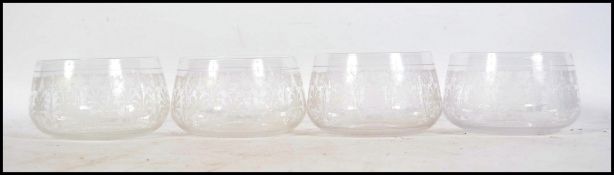 A set of 4 acid etched Aesthetic movement glass bowls. Each with acid etched decoration of oak