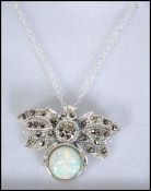 A ladies Art Deco style silver, marcasite and opal