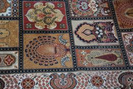 An early 20th century long handwoven Persian rug with red ground having long rectangular panel