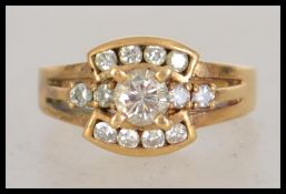 An 750 gold and diamond ring set with central 20pt