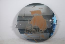 A 1930's ships Art Deco circular wall mirror havin