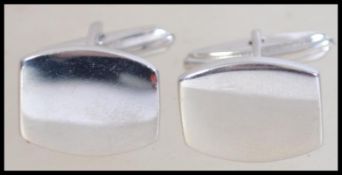 A pair of gentlemans contemporary silver cufflinks