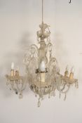 A stunning early 20th century large glass chandelier having 7 branches. The chandelier with stunning