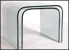 A pair of contemporary 20th century glass coffee t