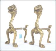 A pair of 19th century Victorian Arts & Crafts andirons - firedogs having ball finials being