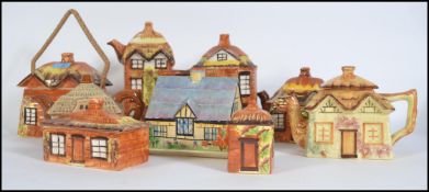 A collection of vintage cottage ware ceramics to include teapots, biscuit barrel, butter dish etc