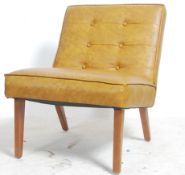 A 1970's retro yellow mustard vinyl nursing chair raised on beechwood angular legs with buttoned