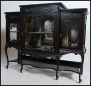 An Edwardian ebonised aesthetic movement display c