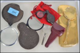 A collection of viewing glass / magnifying glasses