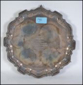 A silver hallmarked salver tray by Edward Viner dating to 1964 having hallmarks for Sheffield.