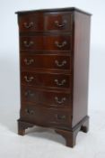 A Georgian style mahogany  bow front pedestal chest of drawers having a run of six straight