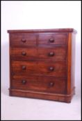 A Victorian mahogany 2 over 3 chest of drawers being raised on a plinth base with 2 short over 3