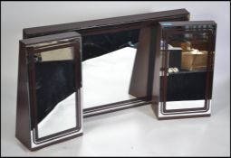 A vintage 1970's retro triptych mirror group. The
