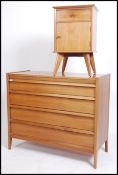 A good Danish inspired mid century solid teak wood chest of drawers. Raised on shaped legs with a