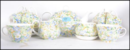 A Queens China ' English Chintz ' tea service comprising teapot, cups, saucers and plates etc