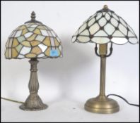 2 contemporary Tiffany style table lamps. Each having leaded and coloured glass shades being
