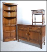 A collection of late 20th century Ercol Golden Dawn beech and elm furniture to include a