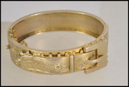 A Victorian silver gilt buckle bracelet having Birmingham assay marks, makers marks for H.BRS and