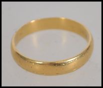 A vintage gentleman's 22ct gold band ring. Hallmarked to inner shank. Size Q.5 / Weight 4.2g.