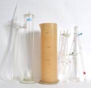 A collection of Industrial Laboratory equipment to include a very large glass measure with cap along