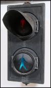 A 20th century / modern Industrial traffic lights , the circular screes with hoods set to
