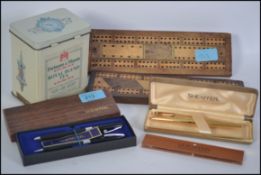 A good mixed lot to include 2 Sheaffer cased pen sets, a polished blue stone bottle stopper, 2