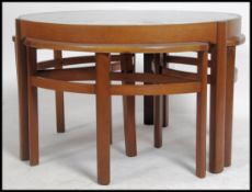 A 1970's Nathan Furniture retro circular glass top teak framed coffee table nest ' Trilogy '