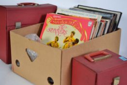 A collection of vinyl long play albums and vinyl 45rpm singles to include various artists dating