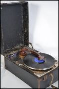 An early 20th century portable Decca 130 gramophone having a later conversion to electric fitted
