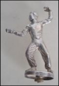 A silver hallmarked car mascot in the form of a fencer. Raised on a plinth base being marked for