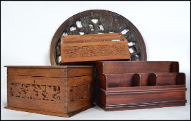 A 19th century oak lattice worked ladies jewellery