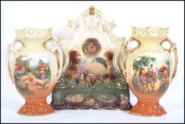 A late 19th early 20th century Staffordshire transfer printed clock surround with near matching