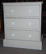 An antique style dwarf painted pine chest of drawe