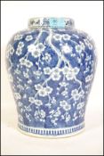 A 20th century Kang-xi revival Chinese blue and white over-sized ginger jar in blue and white