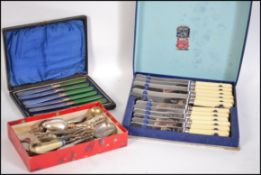 A collection of silver plated wares to  include cased fruit knives, boxes cutlery, loose flatware
