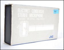 A JVC M201-U Electric Condenser microphone complete in the original case and packaging.