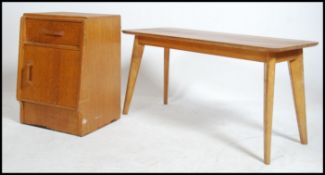 A vintage G-Plan bedside cabinet  in natural oak t
