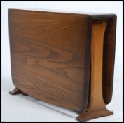 A 20th century ' Golden Dawn ' Ercol elm wood drop