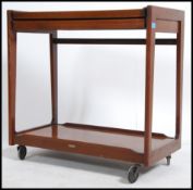 A retro metamorphic drinks / hostess trolley by Wonder Wagon. Having a cantilever mechanism allowing