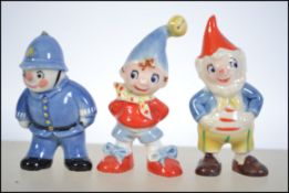 A collection of 3 vintage Wade ceramic figurines t