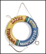 A 20th century lifebuoy having a fantastic later d