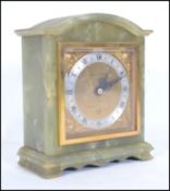 A mid century green marble mantel clock by Mappin & Webb dual marked also for Elliott of London.