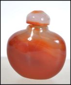 A 20th century Chinese jade snuff bottle of rounde