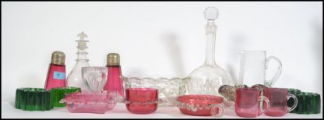 A collection of 19th and 20th century glassware's, to include cranberry sugar shakers, piano