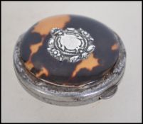 An early 20th century silver and tortoiseshell pen