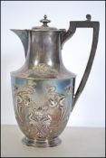 A 19th century Elkington Art Nouveau teapot being