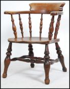 A 19th century Windsor smokers bow elbow chair pri